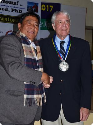 NMA President Santa Bir Lama presents Hillary Medal to Johan Reinhard